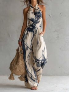 Mono de pierna ancha con cuello halter, estampado estilo tinta y bolsillos
